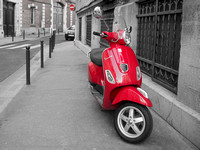 Vespa on sidewalk, Paris