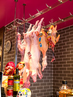 Whole piglets for sale at a butcher shop, Paris